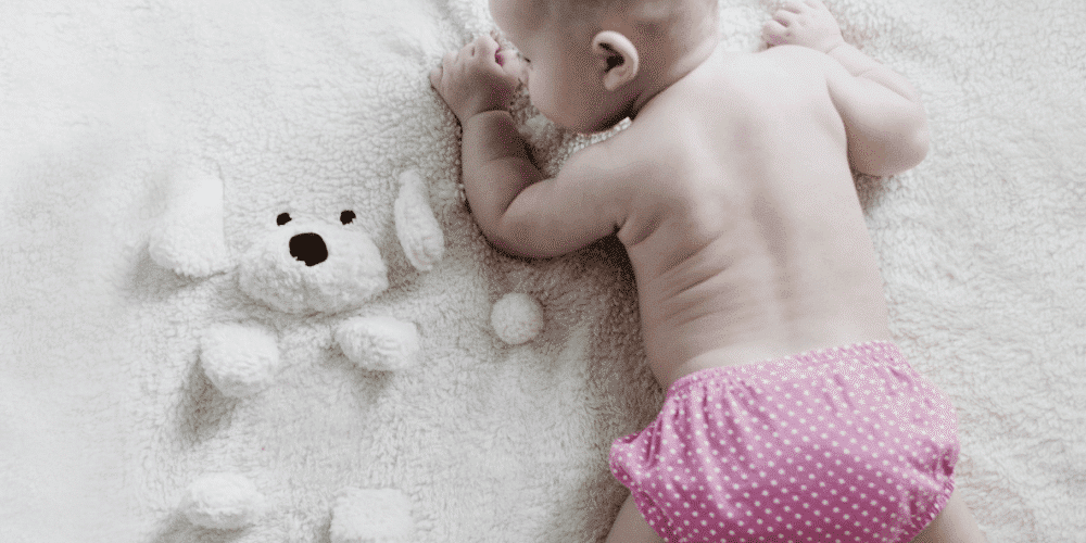 baby playing before sleep